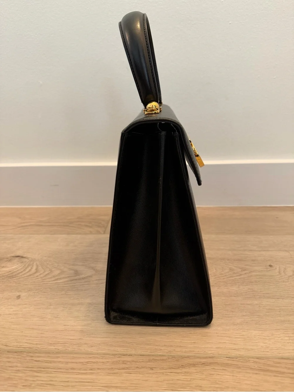 Vintage Salvatore Ferragamo Black Top-Handle Bag with Gold Gancini Closure